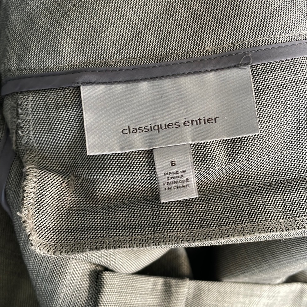 Worn and tailored grey dress trousers wide leg